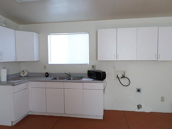 Kitchen has no appliances.