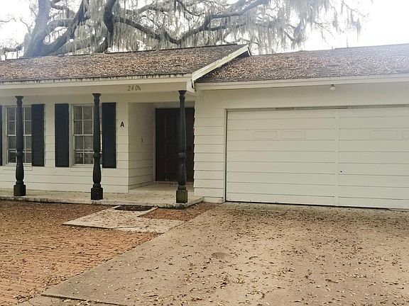 large front porch and 2 car garage