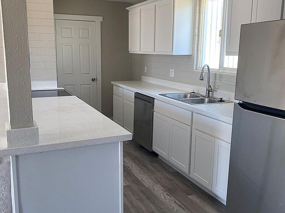 New kitchen, new granite counter tops, new cabinets, new dishwasher, new refrigerator, new stove with built in air fryer, new sink, new faucet, open to living room area