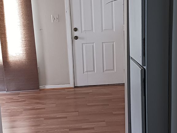 small hallway to living room