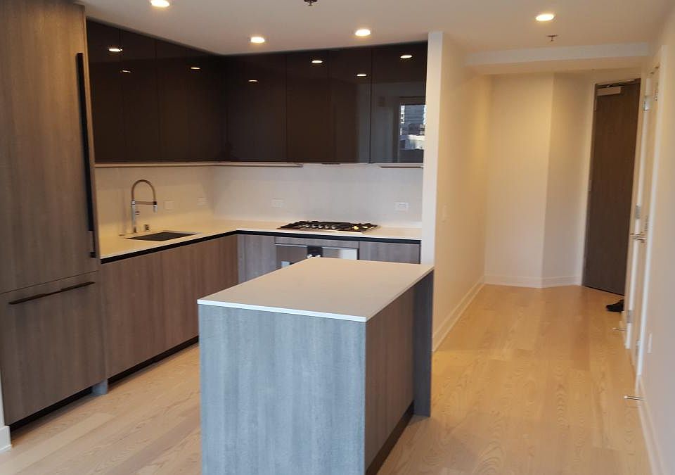 View of kitchen and entry
