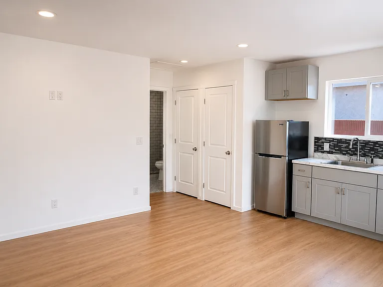 Entrance view: Living Area, Kitchen, Pantry Closet, Laundry closet, Bathroom Entrance