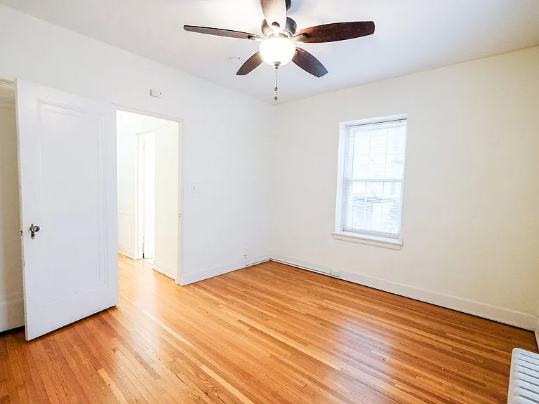 Welcome to Central Lakes of Uptown, where spacious interiors meet modern living. Enjoy the warmth of natural light in this beautifully designed room with gleaming hardwood floors and a stylish ceiling fan. Schedule your visit today!
