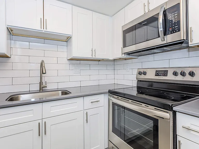 Experience the elegance of a modern kitchen, equipped for culinary creativity.