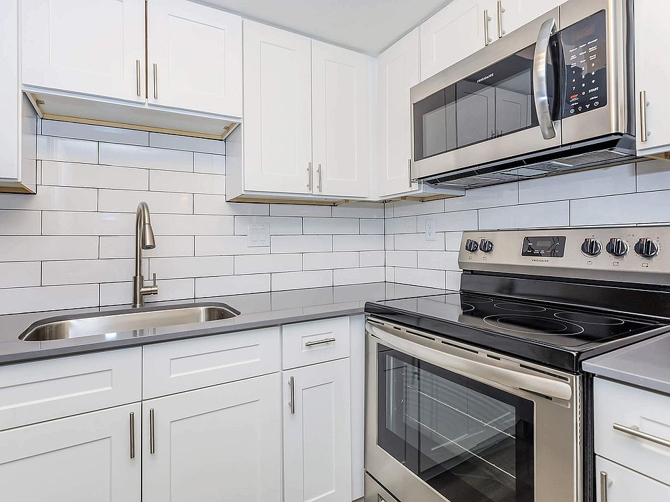 Experience the elegance of a modern kitchen, equipped for culinary creativity.