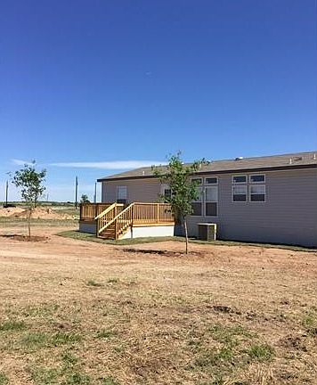 Back deck is 12ftx14ft. Planted two trees. Back yard is 80ft wide and 100ft deep.
