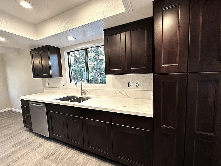 Kitchen with pantry and dining room to the left
