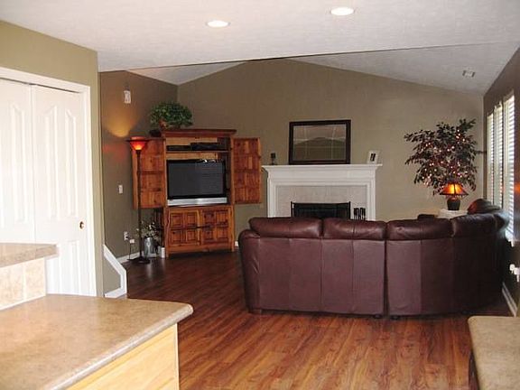 Another view of the open floor plan kitchen, breakfast room and living room