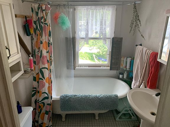 Bathroom with claw-foot tub and excellent morning light