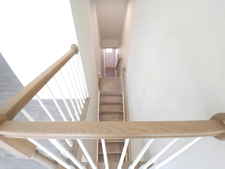 A beautifully sunlit first-floor entrance