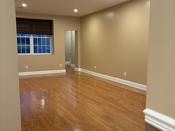 Open Concept Dining/Living Room. View from hallway entry.