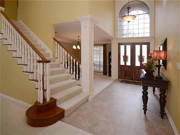 You're welcomed into this home with the brightness and openness of the two story foyer.