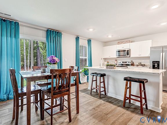 4th image of 205 River Landing Cres