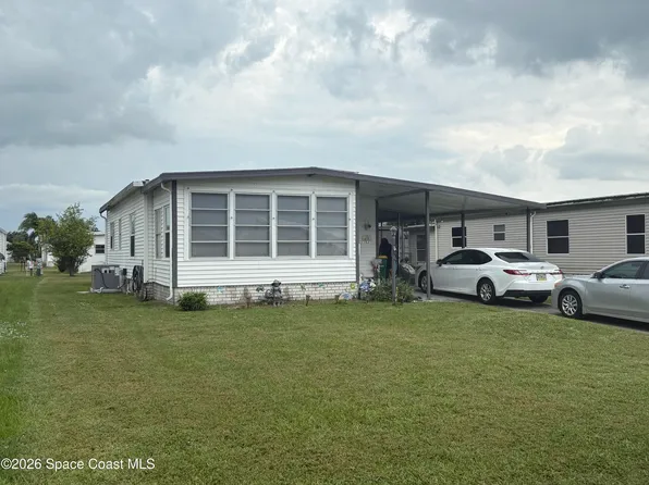 1153 Waterway Dr, Barefoot Bay, FL 32976