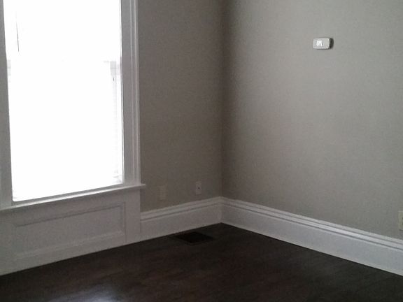 bedroom with 2 large windows