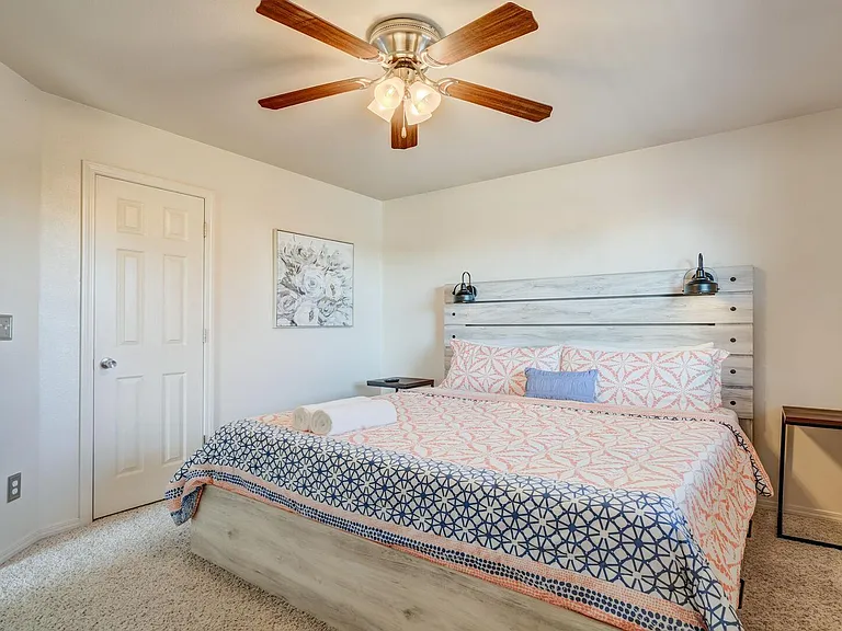 King sized bed on the upper level with a TV!