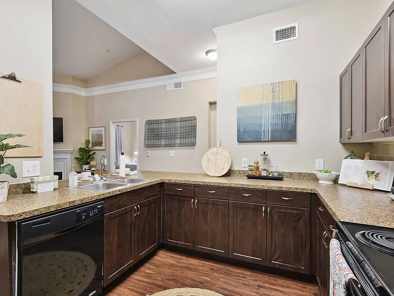 Open and spacious kitchens with ample countertop space.