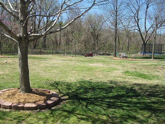 View of the greenbelt from the yard.