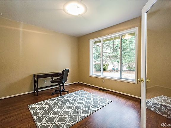 The office has French doors and the natural sunlight makes it an ideal working space...or an additional living room.  There is also a second office on the lower level.
