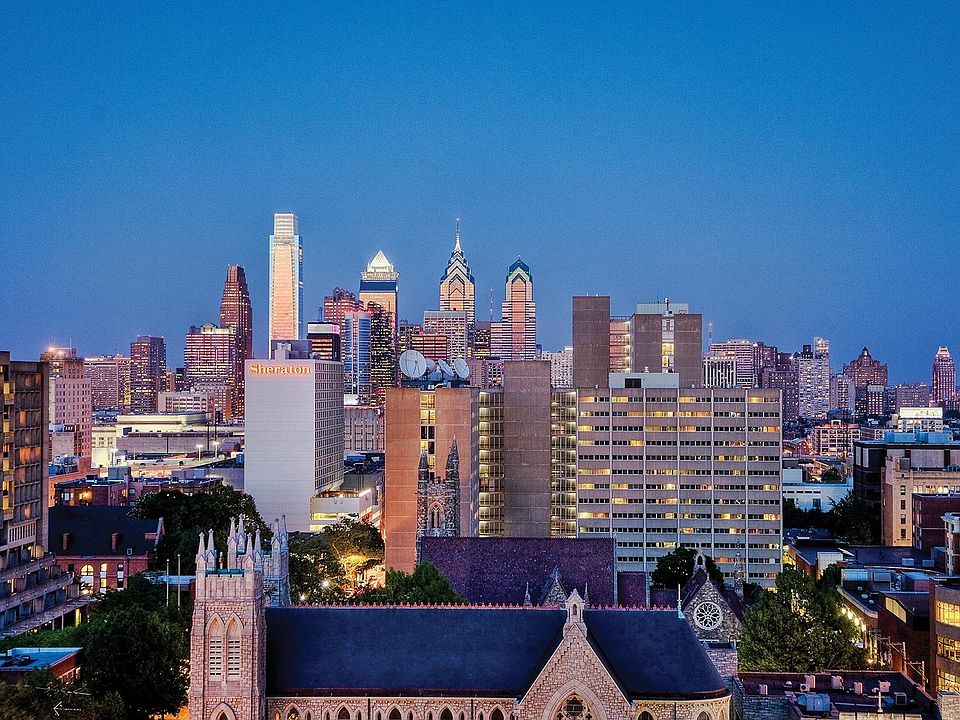 Some apartments include a bay window with a view of U-City and downtown Philly