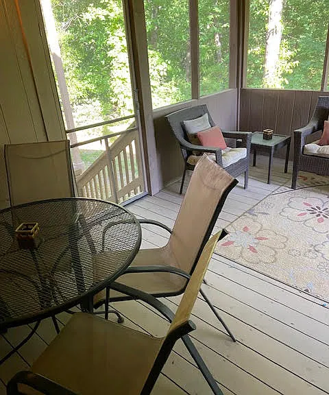 Lower Level Apartment Screened Deck with 50 Inch Mounted Television