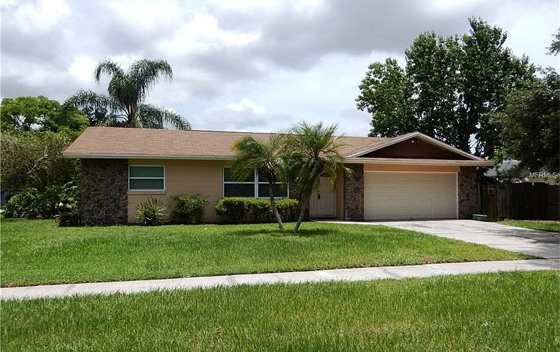 Well-maintained home on large corner lot.