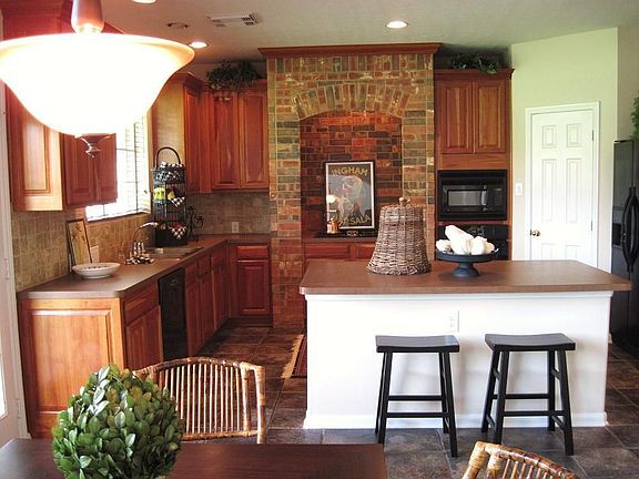 Kitchen with bricked accents