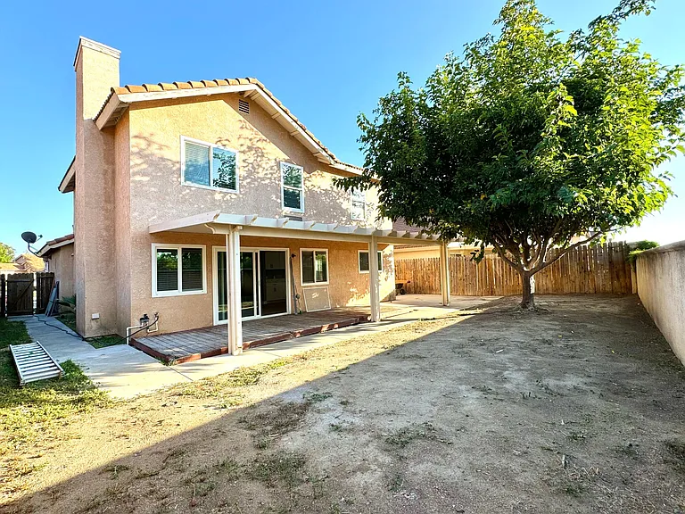 Spacious, open backyard for tenants to enjoy and apply your creativity to make it your own.