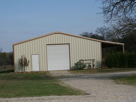 Great Barn with roll up doors on front and back!
