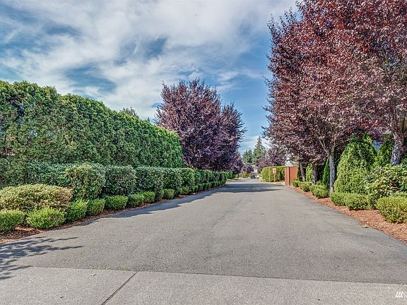 Very secluded private entrance with mature landscaping as you drive back into the complex. >