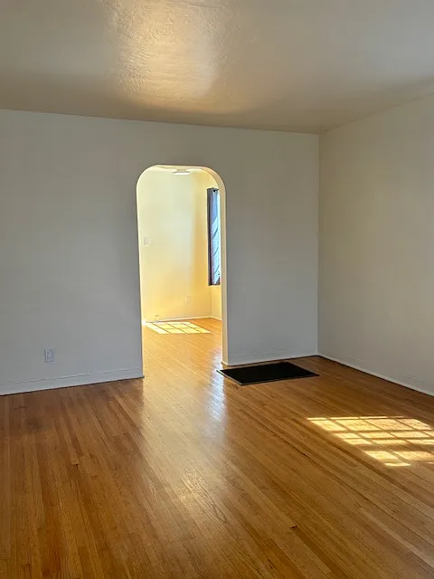 Living area looking into kitchen/dining