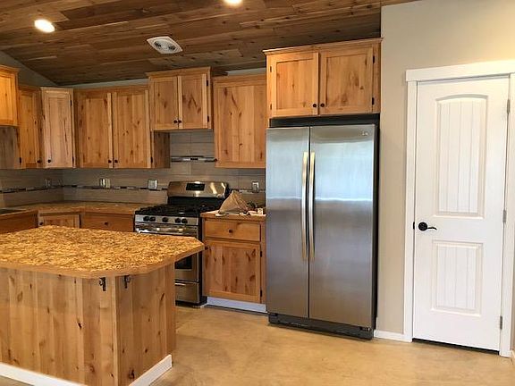 Kitchen with pantry door