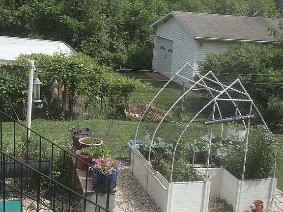 Raised beds, carport, garage