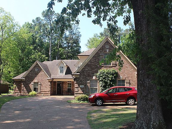 3 Car Garage Plus Pad