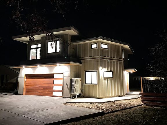 Unit at night with entrance on right side.
