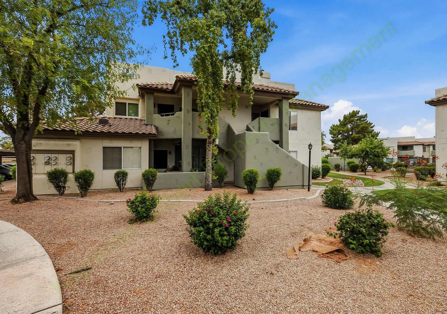 Freshly Updated 2-Bedroom Condo in Gated Lakeshore at Andersen Springs New Paint & New Carpet! — Photo 1