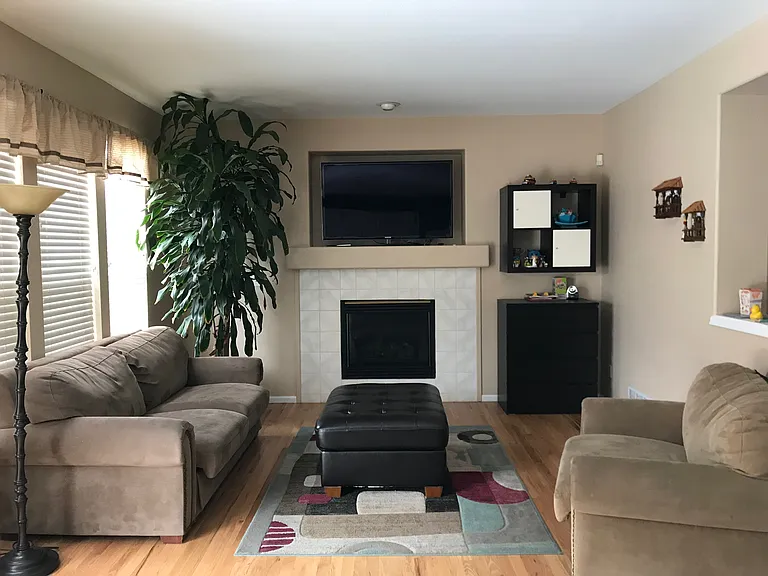 Family room before new paint and with furniture