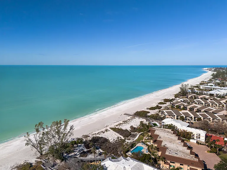 an aerial beach view from our private deeded beach access