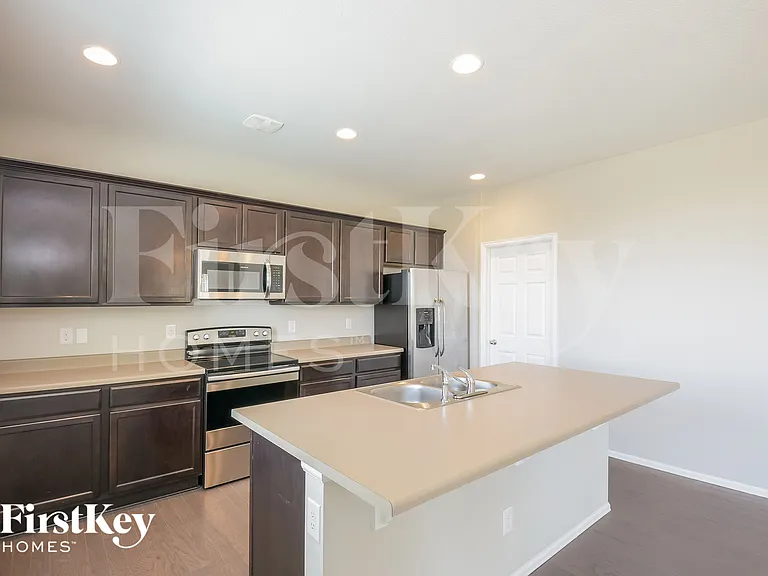 6481 N Dunkirk Ct — Photo 6