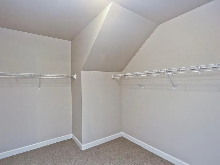 Huge walk in closet in master bedroom