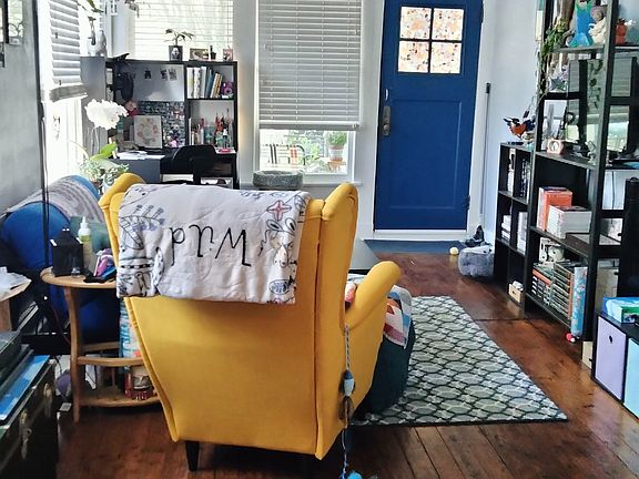 Living room looking towards blue front door