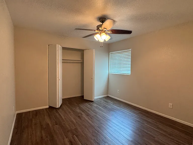 Bedroom 2 with wall-to-wall closet