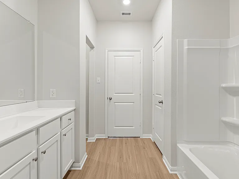 The master bathroom includes a linen closet.