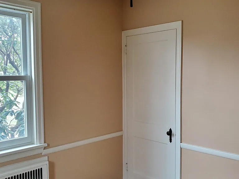 Den side entrance, stairs to basement