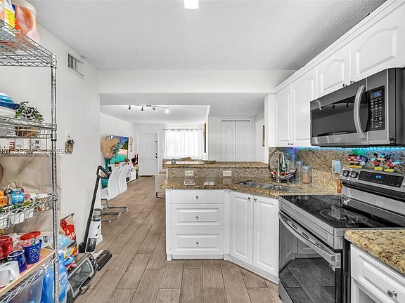 4th image of 7439 W 22nd Ave APT 103