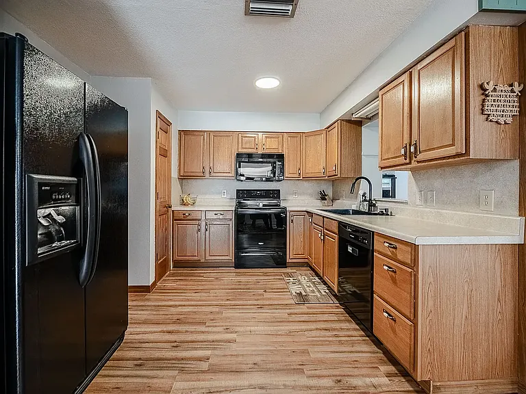 5905 Whispering Pines Rd — Photo 24
