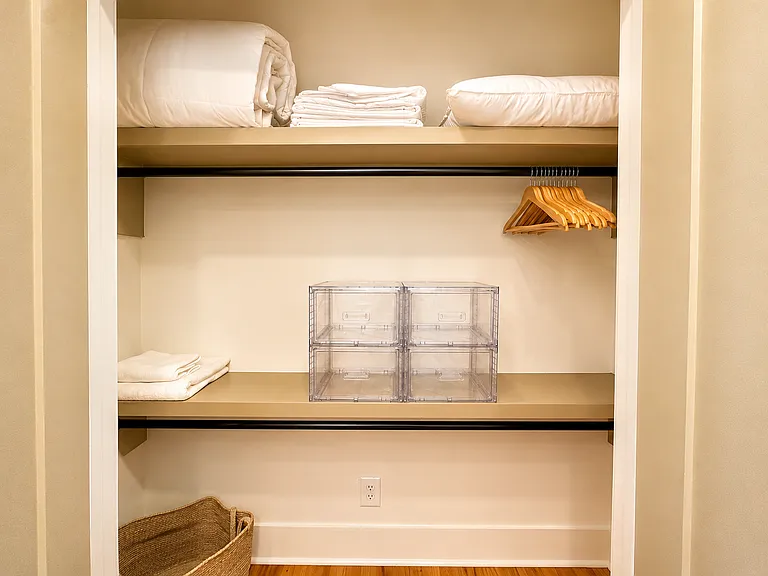 Welcome to the Kirkwood Suite. This double queen retreat with plush bedding, Smart TV, blackout curtains, and lounge-worthy comfort is designed for restful sleep, peaceful mornings, and cozy late-night streaming after a day exploring Atlanta.