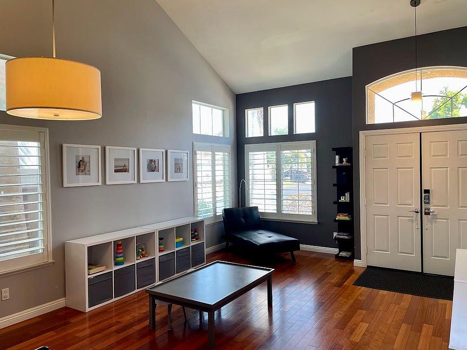 Double wide front door. Vaulted ceiling. Home designed with lots of natural light.