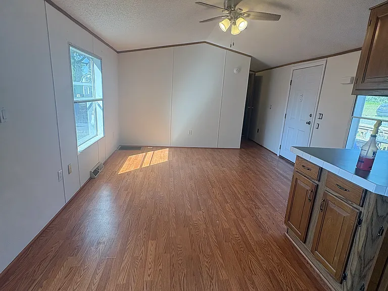 Living room and area for dining room table
