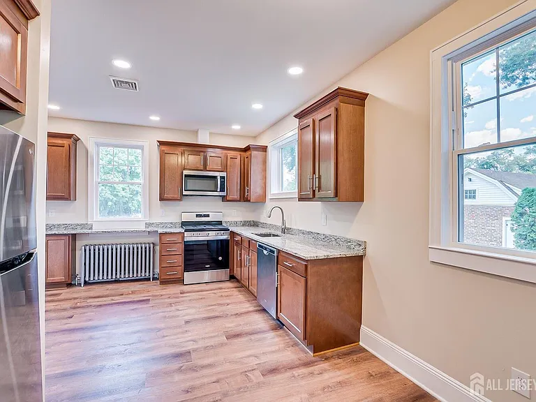 338 Buckelew Ave — Photo 8